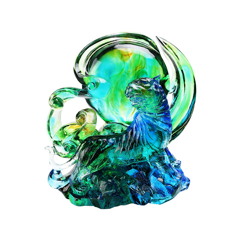 Blågrønn gjennomsiktig tigerpynt i krystallglass