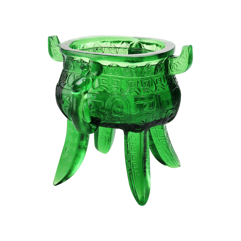 Smaragdgrønt stativ i krystallglass med øreformede håndtak