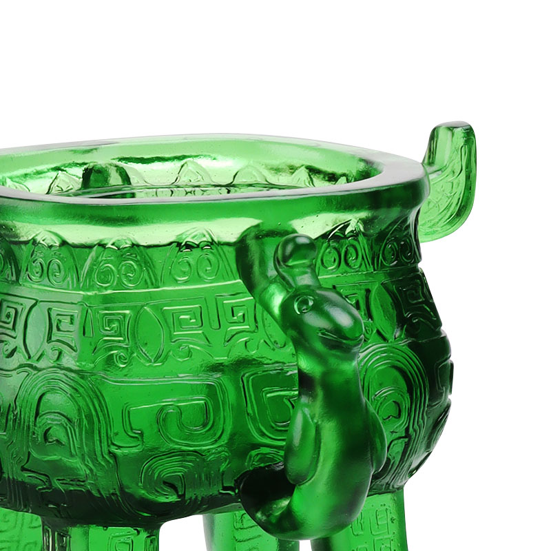 Smaragdgrønt stativ i krystallglass med øreformede håndtak