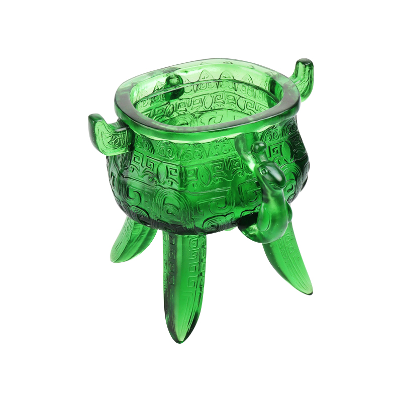 Smaragdgrønt stativ i krystallglass med øreformede håndtak