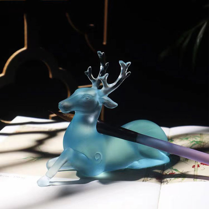 Hjorteformet børsteholder i blått glass