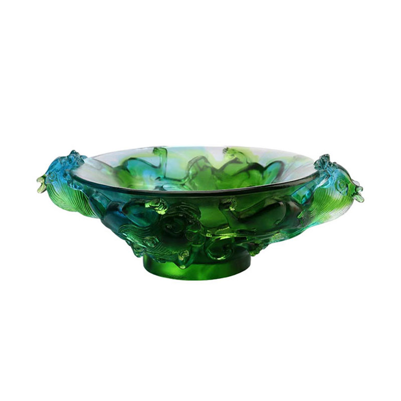 Gjennomsiktig grønn fruktfat i glass