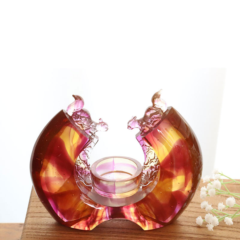 Lilla farget glasur lysestake