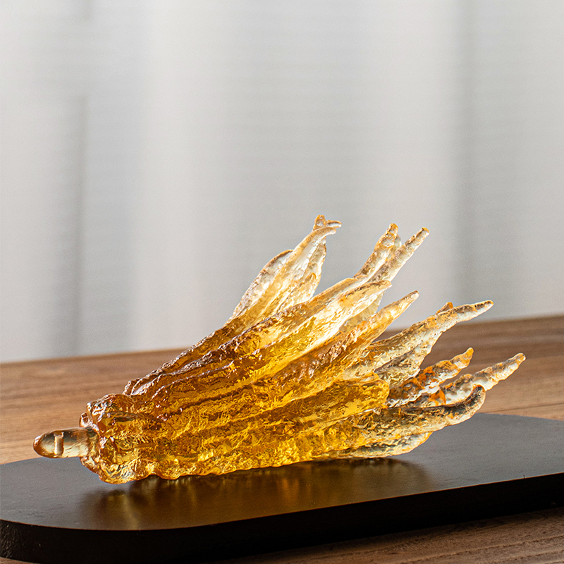 Håndformet røkelsesholder i gyldent glass