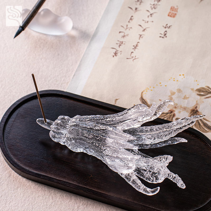 Håndformet røkelsesholder i gyldent glass