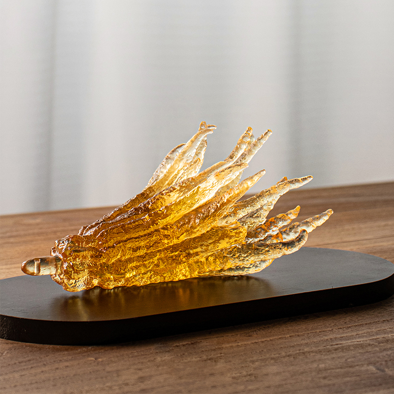 Håndformet røkelsesholder i gyldent glass